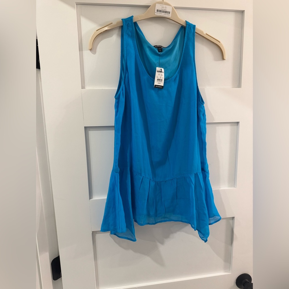 Silk peplum tank top. Size medium. NWTs.